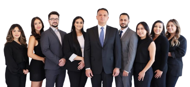 The Yarijanian & Associates team standing together in dark business clothes